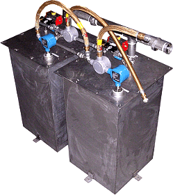 Two-tank solvent collection system with automatic changeover between tanks